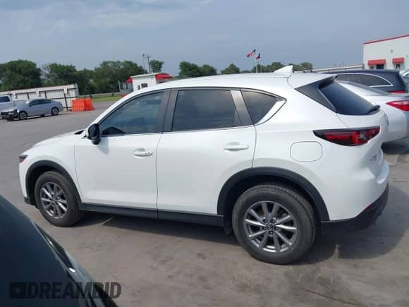 2022 Mazda CX-5 S Select с VIN JM3KFBBM9N0630312, выставлен на аукционе IAAI как лот 42266500 с пробегом 56 430 миль миль и . История ставок и продаж доступна на DreamBid. Изображение 14.