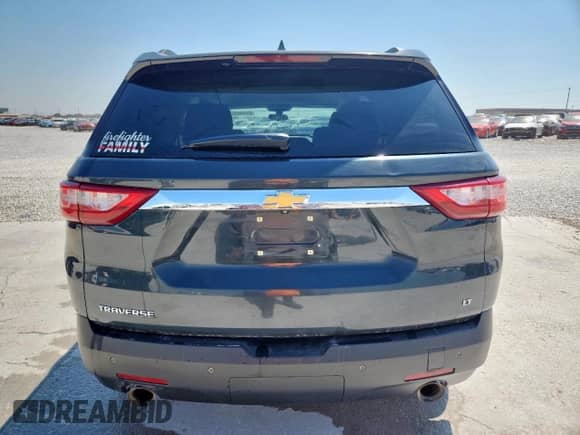 2020 Chevrolet Traverse LT Cloth z VIN 1GNERGKW1LJ228519, wystawiony jako Copart lot #80440645 z przebiegiem 128 089 mil mil oraz Czysty tytuł • Clean title. Historia ofert i sprzedaży dostępna na DreamBid. Obrazek 6.