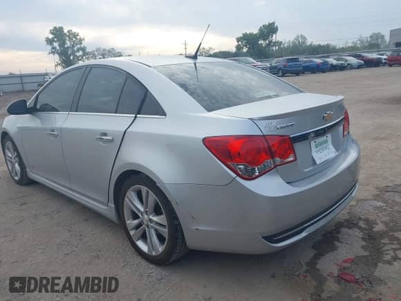 2014 Chevrolet Cruze LTZ with VIN 1G1PG5SB3E7149676, listed as a IAAI auction lot 43335255 with 129,994 mi miles and . Bid and sale history available at DreamBid. Image 3.