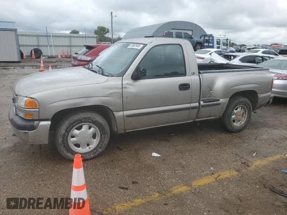 1999 GMC Sierra 1500 SL with VIN 1GTEC14W4XZ513002, listed as a Copart auction lot 55982605 with 72,670 mi miles and Salvage title. Bid and sale history available at DreamBid. Image 1.