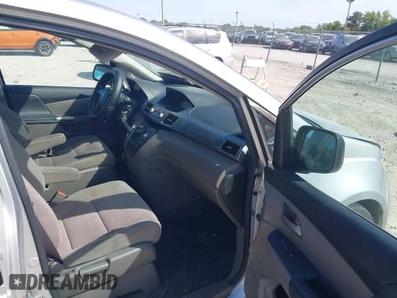 2011 Honda Odyssey LX with VIN 5FNRL5H2XBB028555, listed as a IAAI auction lot 43194763 with 164,504 mi miles and . Bid and sale history available at DreamBid. Image 5.