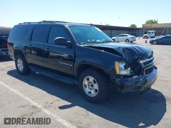 2009 Chevrolet Suburban 2LT z VIN 1GNFC26089R264006, wystawiony jako IAAI lot #42761708 z przebiegiem 199 609 mil mil oraz . Historia ofert i sprzedaży dostępna na DreamBid. Obrazek 1.