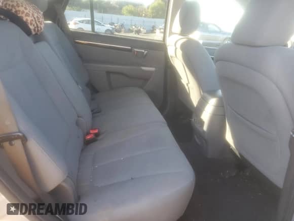 2012 Hyundai Santa Fe GLS с VIN 5XYZG3AB1CG123017, выставлен на аукционе Copart как лот 69345564 с пробегом 170 744 миль миль и Чистый • Clean title. История ставок и продаж доступна на DreamBid. Изображение 10.