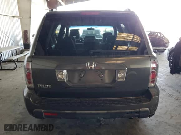 2006 Honda Pilot EX z VIN 5FNYF28476B024309, wystawiony jako Copart lot #80084965 z przebiegiem 202 625 mil mil oraz Szkoda całkowita • Salvage title. Historia ofert i sprzedaży dostępna na DreamBid. Obrazek 6.