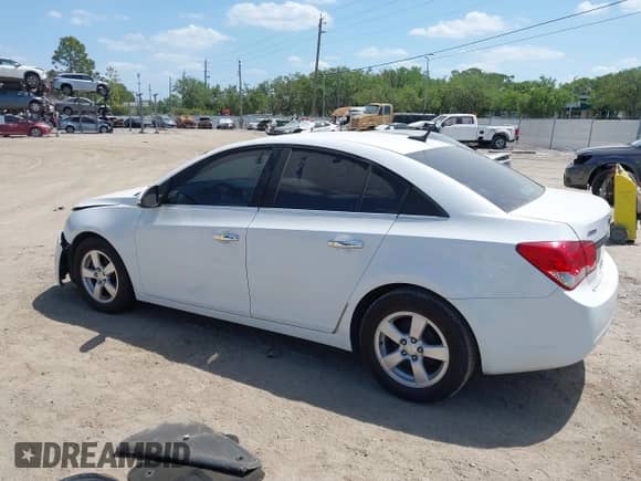 2014 Chevrolet Cruze 1LT z VIN 1G1PC5SB7E7166217, wystawiony jako IAAI lot #41839197 z przebiegiem 133 436 mil mil oraz . Historia ofert i sprzedaży dostępna na DreamBid. Obrazek 14.