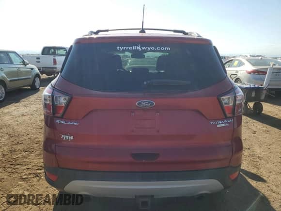2017 Ford Escape Titanium with VIN 1FMCU9J90HUD53762, listed as a Copart auction lot 68472965 with 122,030 mi miles and Salvage title. Bid and sale history available at DreamBid. Image 6.