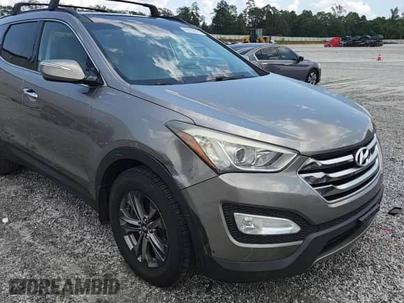 2015 Hyundai Santa Fe z VIN 5XYZUDLB1FG294690, wystawiony jako Copart lot #65039015 z przebiegiem 144 835 mil mil oraz Szkoda całkowita • Salvage title. Historia ofert i sprzedaży dostępna na DreamBid. Obrazek 14.