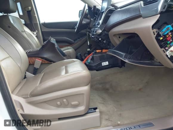 2019 Chevrolet Suburban Premier with VIN 1GNSCJKC9KR126778, listed as a IAAI auction lot 42675554 with 164,489 mi miles and . Bid and sale history available at DreamBid. Image 5.