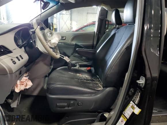 2014 Toyota Sienna SE with VIN 5TDXK3DC7ES482016, listed as a Copart auction lot 69857475 with 136,304 mi miles and Salvage title. Bid and sale history available at DreamBid. Image 7.