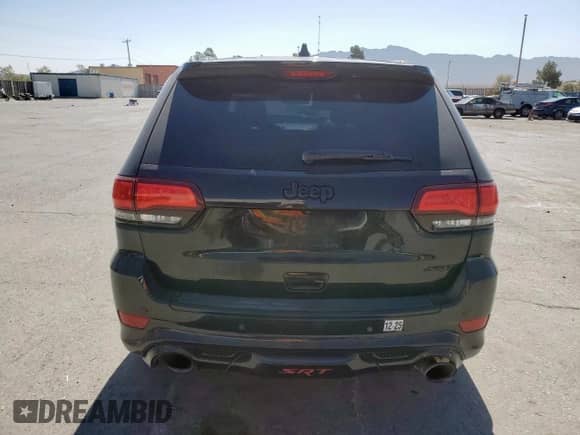 2016 Jeep Grand Cherokee SRT z VIN 1C4RJFDJ3GC454648, wystawiony jako Copart lot #57988235 z przebiegiem 104 364 mil mil oraz Szkoda całkowita • Salvage title. Historia ofert i sprzedaży dostępna na DreamBid. Obrazek 6.