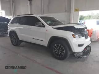 2020 Jeep Grand Cherokee Trailhawk with VIN 1C4RJFLG6LC387690, listed as a IAAI auction lot 43126007 with 67,940 mi miles and . Bid and sale history available at DreamBid. Image 1.