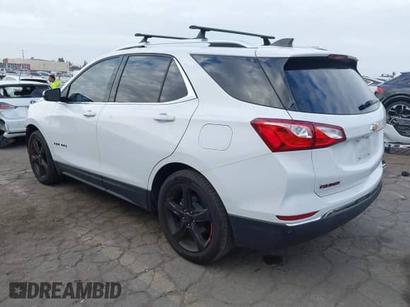 2018 Chevrolet Equinox LT с VIN 2GNAXJEV0J6352926, выставлен на аукционе IAAI как лот 43259696 с пробегом 70 395 миль миль и . История ставок и продаж доступна на DreamBid. Изображение 3.