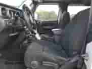 2020 Jeep Wrangler Sport S with VIN 1C4GJXAG5LW302823, listed as a Copart auction lot 71611065 with 67,430 mi miles and Salvage title. Bid and sale history available at DreamBid. Image 7.