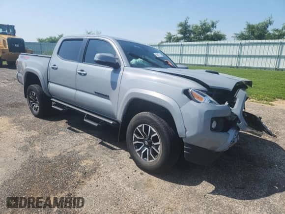 2020 Toyota Tacoma SR5 z VIN 3TMCZ5AN3LM365185, wystawiony jako Copart lot #65887715 z przebiegiem 123 533 mil mil oraz Szkoda całkowita • Salvage title. Historia ofert i sprzedaży dostępna na DreamBid. Obrazek 4.