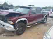 2002 Dodge Dakota SLT with VIN 1B7HG48N72S534240, listed as a IAAI auction lot 42718329 with 176,675 mi miles and . Bid and sale history available at DreamBid. Image 2.