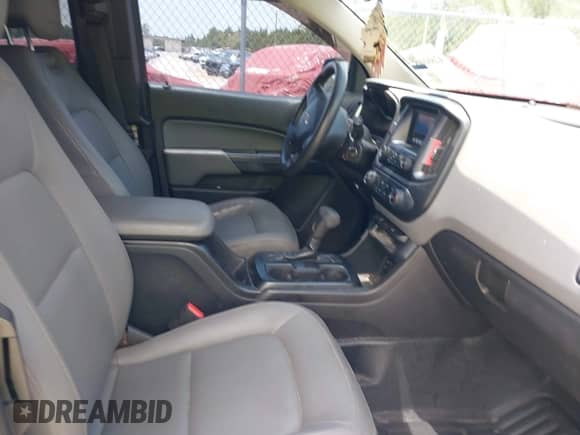 2015 Chevrolet Colorado 2WD WT z VIN 1GCHSAEA5F1142299, wystawiony jako IAAI lot #42604965 z przebiegiem 196 196 mil mil oraz . Historia ofert i sprzedaży dostępna na DreamBid. Obrazek 5.