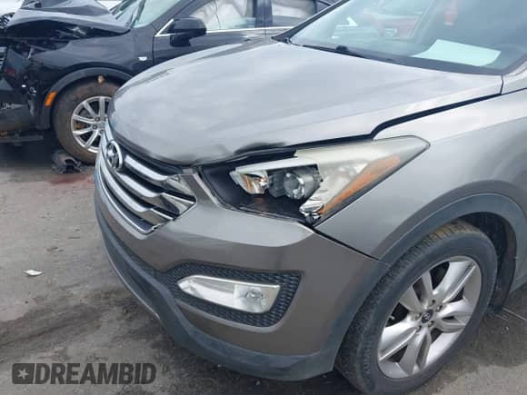 2015 Hyundai Santa Fe с VIN 5XYZW4LA3FG294370, выставлен на аукционе IAAI как лот 42947014 с пробегом 156 558 миль миль и . История ставок и продаж доступна на DreamBid. Изображение 6.
