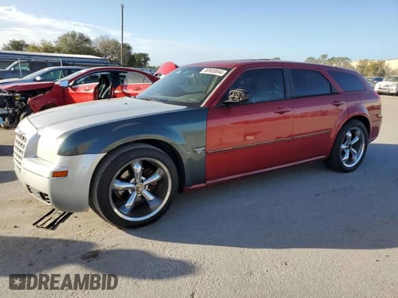 2006 Dodge Magnum with VIN 2D4FV47V46H200679, listed as a Copart auction lot 80905844 with 296,243 mi miles and Salvage title. Bid and sale history available at DreamBid. Image 1.