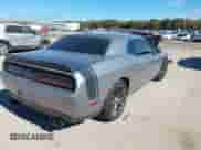2018 Dodge Challenger R/T Scat Pack with VIN 2C3CDZFJ2JH300887, listed as a IAAI auction lot 43447415 with 83,601 mi miles and . Bid and sale history available at DreamBid. Image 4.