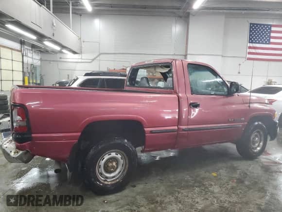 1999 Dodge 1500 with VIN 3B7HC16Y0XM505489, listed as a Copart auction lot 44570345 with 197,705 mi miles and Salvage title. Bid and sale history available at DreamBid. Image 3.