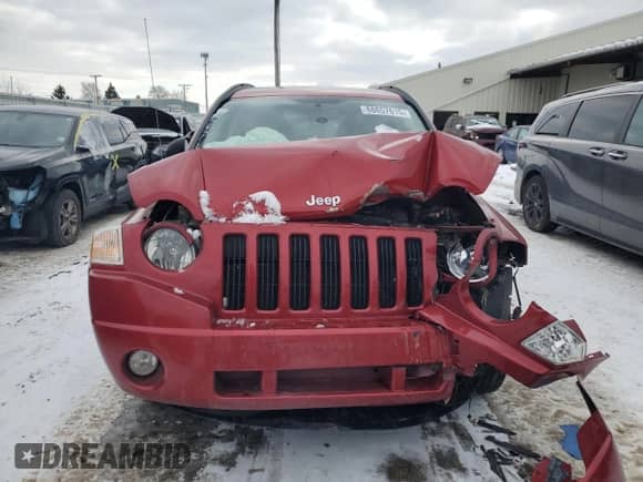 2010 Jeep Compass Latitude z VIN 1J4NF1FB0AD623710, wystawiony jako Copart lot #88657615 z przebiegiem Nie podano mil oraz Szkoda całkowita • Salvage title. Historia ofert i sprzedaży dostępna na DreamBid. Obrazek 5.