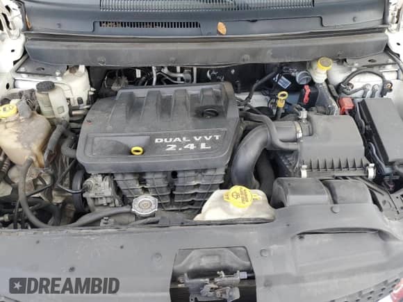 2015 Dodge Journey SXT with VIN 3C4PDCBBXFT595146, listed as a Copart auction lot 68080395 with 205,925 mi miles and Salvage title. Bid and sale history available at DreamBid. Image 12.