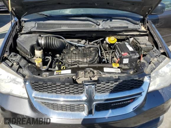 2016 Dodge Grand Caravan American Value z VIN 2C4RDGBG9GR262730, wystawiony jako Copart lot #90404065 z przebiegiem 181 105 mil mil oraz Czysty tytuł • Clean title. Historia ofert i sprzedaży dostępna na DreamBid. Obrazek 12.