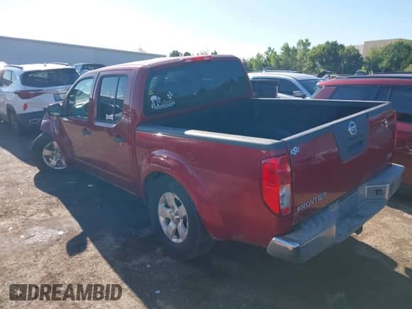 2011 Nissan Frontier SV with VIN 1N6AD0ER0BC421005, listed as a IAAI auction lot 43225017 with 166,240 mi miles and . Bid and sale history available at DreamBid. Image 3.