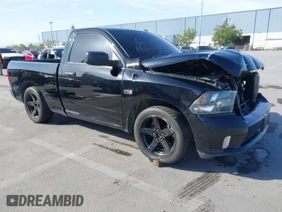 2014 Ram 1500 Express z VIN 3C6JR6ATXEG192303, wystawiony jako IAAI lot #42087281 z przebiegiem 58 597 mil mil oraz . Historia ofert i sprzedaży dostępna na DreamBid. Obrazek 1.