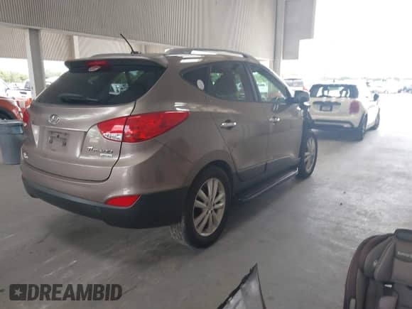 2013 Hyundai Tucson Limited с VIN KM8JU3AC8DU684440, выставлен на аукционе IAAI как лот 42662948 с пробегом 196 626 миль миль и . История ставок и продаж доступна на DreamBid. Изображение 4.