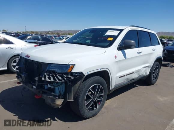 2019 Jeep Grand Cherokee Trailhawk with VIN 1C4RJFLT2KC762132, listed as a IAAI auction lot 42131964 with 92,477 mi miles and . Bid and sale history available at DreamBid. Image 6.