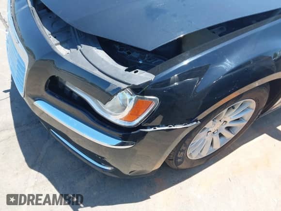 2013 Chrysler 300 with VIN 2C3CCAAG5DH508539, listed as a IAAI auction lot 42557370 with 209,421 mi miles and . Bid and sale history available at DreamBid. Image 17.