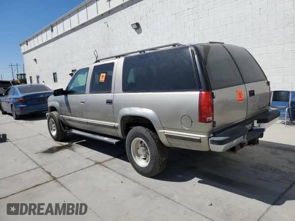 1998 Chevrolet Suburban с VIN 1GNGK26J8WJ328152, выставлен на аукционе Copart как лот 66725315 с пробегом Не указан миль и Чистый • Clean title. История ставок и продаж доступна на DreamBid. Изображение 2.