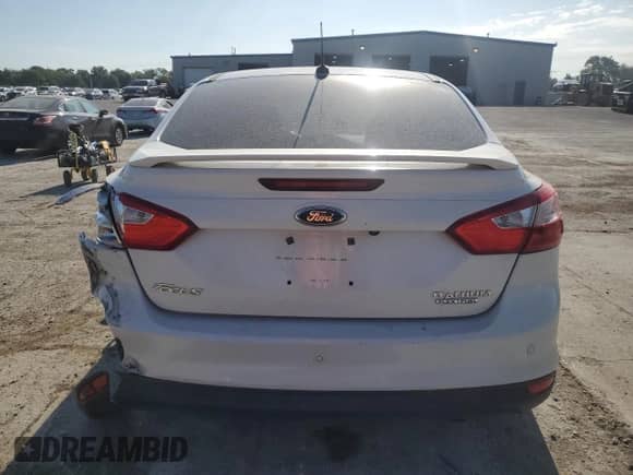2014 Ford Focus Titanium with VIN 1FADP3J26EL218485, listed as a Copart auction lot 69675825 with Not provided miles and Salvage title. Bid and sale history available at DreamBid. Image 6.