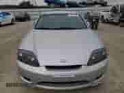 2005 Hyundai Tiburon GT с VIN KMHHN65F45U174430, выставлен на аукционе Copart как лот 70741785 с пробегом Не указан миль и На запчасти • Non repairable. История ставок и продаж доступна на DreamBid. Изображение 5.