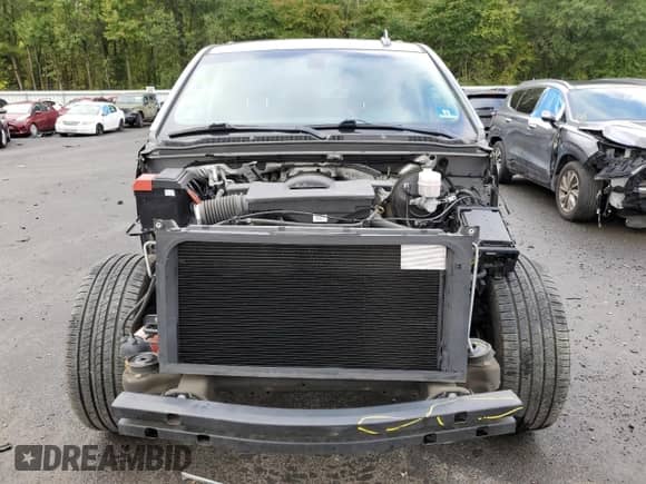 2018 Chevrolet Tahoe LS with VIN 1GNSKAKC1JR216489, listed as a Copart auction lot 81259495 with 65,446 mi miles and Salvage title. Bid and sale history available at DreamBid. Image 5.