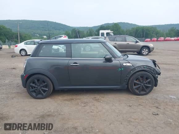 2011 MINI Hardtop S with VIN WMWSV3C58BTY13412, listed as a IAAI auction lot 42516587 with 124,831 mi miles and . Bid and sale history available at DreamBid. Image 14.
