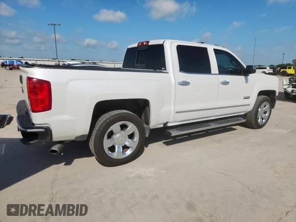 2017 Chevrolet Silverado 1500 LTZ with VIN 3GCPCSECXHG145834, listed as a Copart auction lot 65348985 with 153,460 mi miles and Salvage title. Bid and sale history available at DreamBid. Image 3.