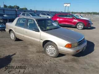 1992 Dodge Spirit z VIN 3B3XA4638NT238159, wystawiony jako IAAI lot #43300458 z przebiegiem 158 922 mil mil oraz . Historia ofert i sprzedaży dostępna na DreamBid. Obrazek 1.