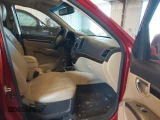 2010 Hyundai Santa Fe Limited z VIN 5NMSK4AG7AH404677, wystawiony jako IAAI lot #43210523 z przebiegiem 167 467 mil mil oraz . Historia ofert i sprzedaży dostępna na DreamBid. Obrazek 5.