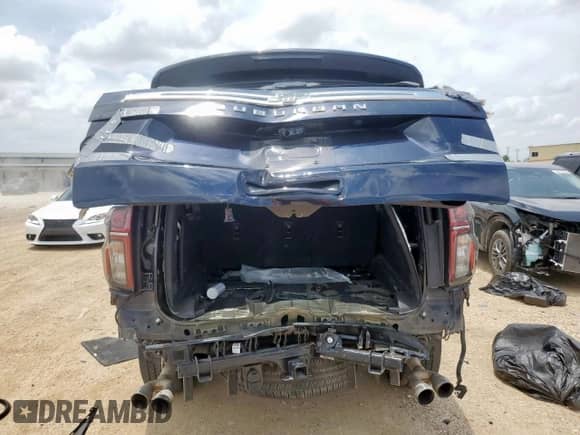 2021 Chevrolet Suburban High Country with VIN 1GNSKGKL6MR276002, listed as a Copart auction lot 57682825 with 67,706 mi miles and Salvage title. Bid and sale history available at DreamBid. Image 6.