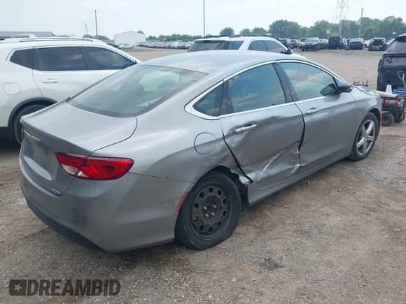 2015 Chrysler 200 LX with VIN 1C3CCCFB2FN733942, listed as a IAAI auction lot 42902307 with 197,311 mi miles and . Bid and sale history available at DreamBid. Image 4.