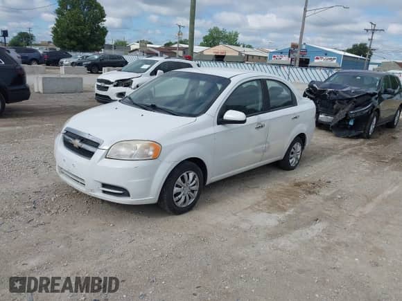 2011 Chevrolet Aveo 1LT with VIN KL1TD5DE6BB255979, listed as a IAAI auction lot 42771013 with 128,636 mi miles and . Bid and sale history available at DreamBid. Image 2.