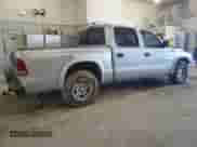 2002 Dodge Dakota Sport z VIN 1B7HL38N62S507858, wystawiony jako Copart lot #48331335 z przebiegiem 200 521 mil mil oraz Szkoda całkowita • Salvage title. Historia ofert i sprzedaży dostępna na DreamBid. Obrazek 3.
