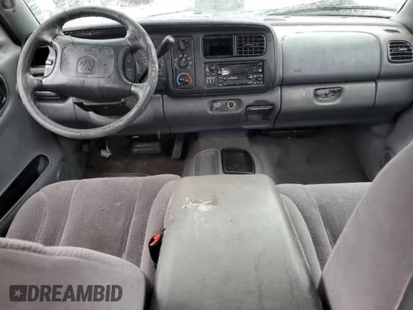 2000 Dodge Dakota Sport z VIN 1B7GL2AX7YS640249, wystawiony jako Copart lot #55989395 z przebiegiem Nie podano mil oraz Nie do naprawy • Non repairable. Historia ofert i sprzedaży dostępna na DreamBid. Obrazek 8.