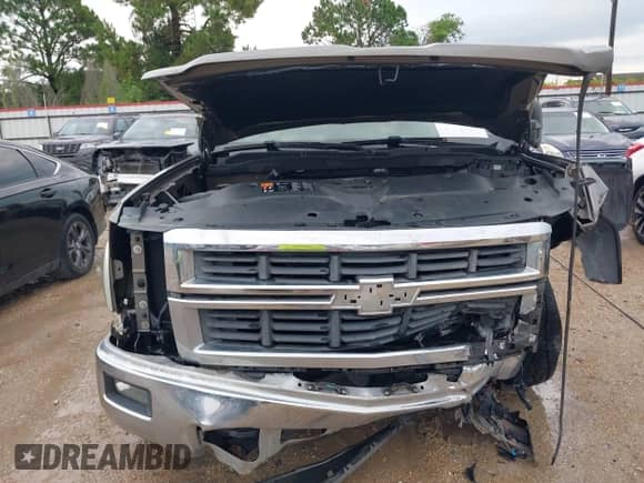 2014 Chevrolet Silverado 1500 LT z VIN 3GCUKREC3EG365715, wystawiony jako IAAI lot #43303491 z przebiegiem 204 802 mil mil oraz . Historia ofert i sprzedaży dostępna na DreamBid. Obrazek 11.