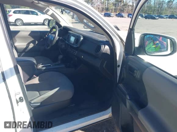 2016 Toyota Tacoma SR with VIN 5TFRX5GN4GX058969, listed as a IAAI auction lot 43590771 with 237,437 mi miles and . Bid and sale history available at DreamBid. Image 5.