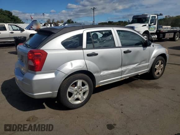 2007 Dodge Caliber SXT z VIN 1B3HB48B07D315802, wystawiony jako Copart lot #81734655 z przebiegiem 174 760 mil mil oraz Szkoda całkowita • Salvage title. Historia ofert i sprzedaży dostępna na DreamBid. Obrazek 3.