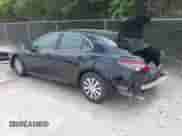 2022 Toyota Camry Hybrid LE with VIN 4T1C31AK3NU574937, listed as a IAAI auction lot 43038140 with 50,708 mi miles and . Bid and sale history available at DreamBid. Image 3.