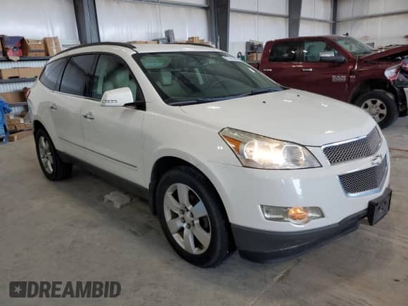 2012 Chevrolet Traverse LTZ с VIN 1GNKRLED4CJ379716, выставлен на аукционе Copart как лот 67741385 с пробегом 145 473 миль миль и Списание • Salvage title. История ставок и продаж доступна на DreamBid. Изображение 4.
